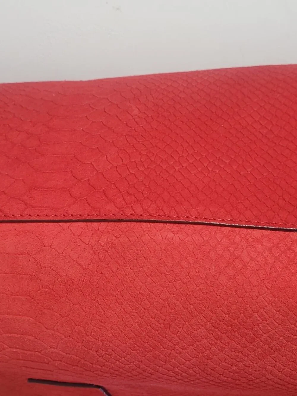 19. Kate Spade New York Red Embossed Suede Large Top Handle Bag